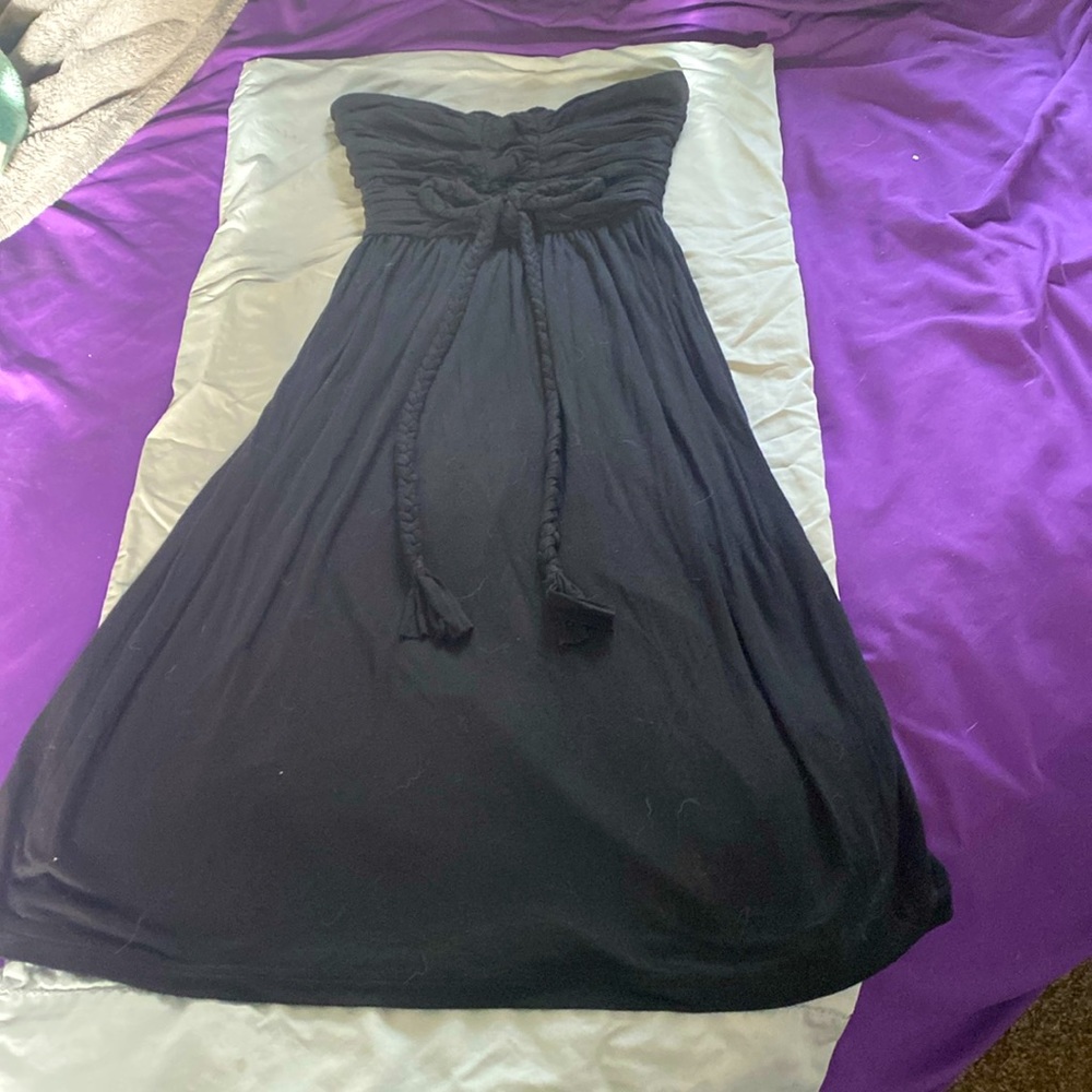 Cute strapless little black cotton dress.  Fits very well around chest.